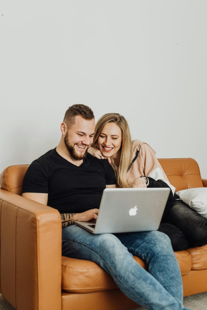 couple review their guests list.
