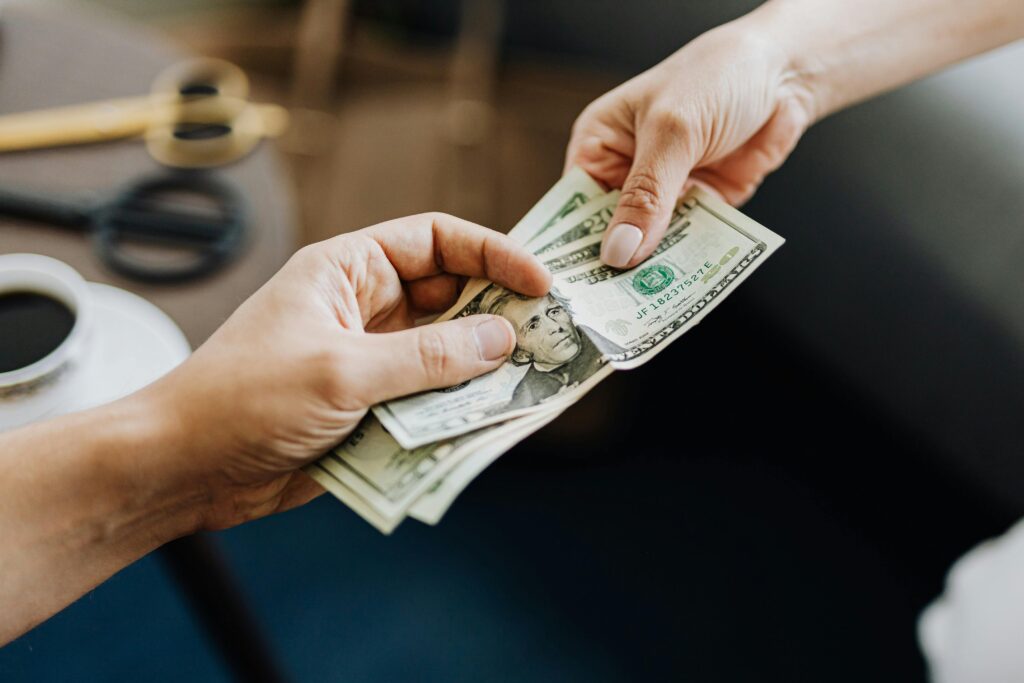 paying a bill with cash money